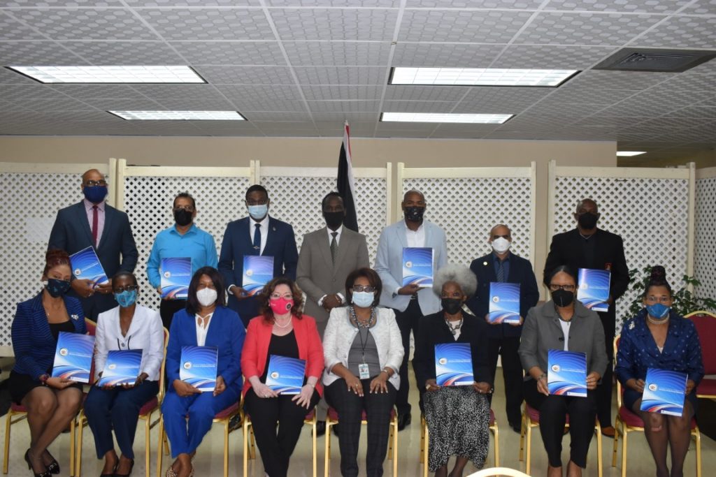 Minister Hinds Presents Instruments Of Appointment To The National Task Force Against Trafficking In Persons Working Group